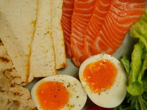 cheap high protein foods in India — eggs, soya chunks, dal, chicken arranged on a table
